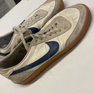 Nike White and Blue Sneakers with Retro Design and Gum Sole